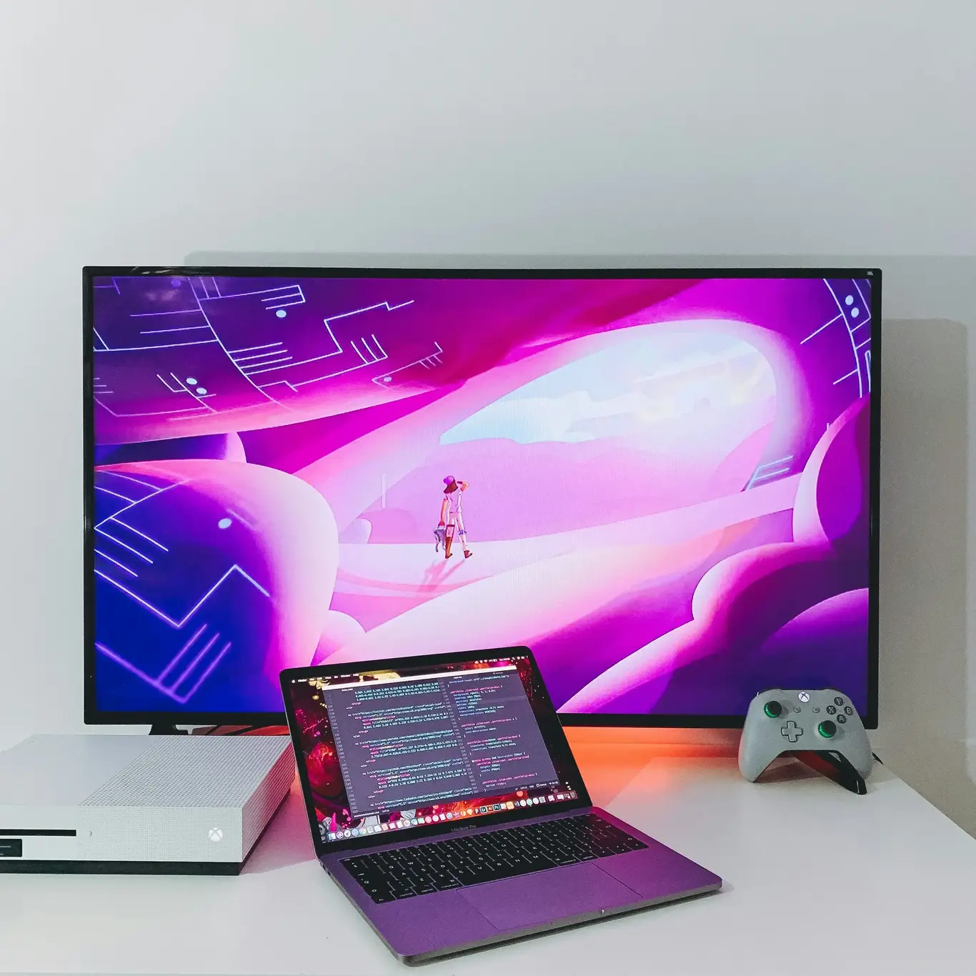 Desktop and laptop on table