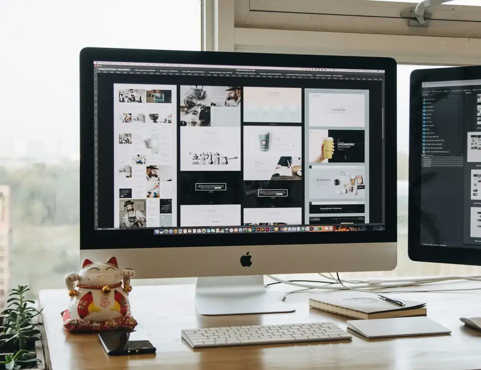 Desktop and laptop showing website design