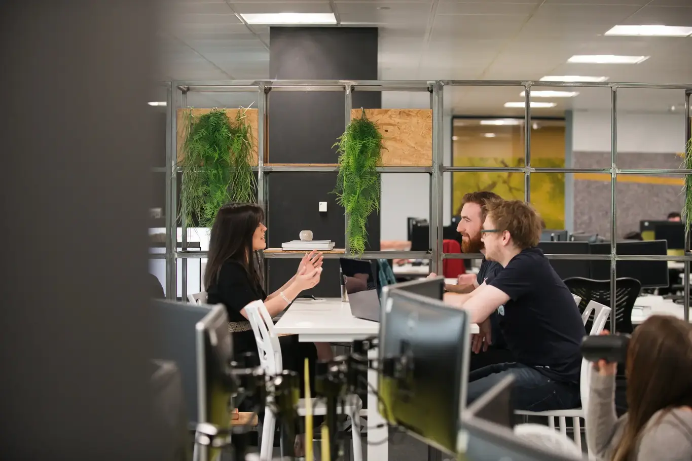 a group of people sitting at a table