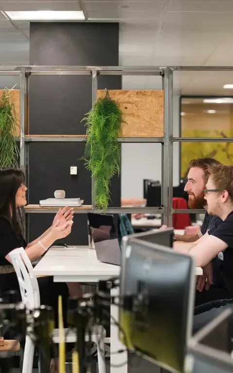 a group of people sitting at a table