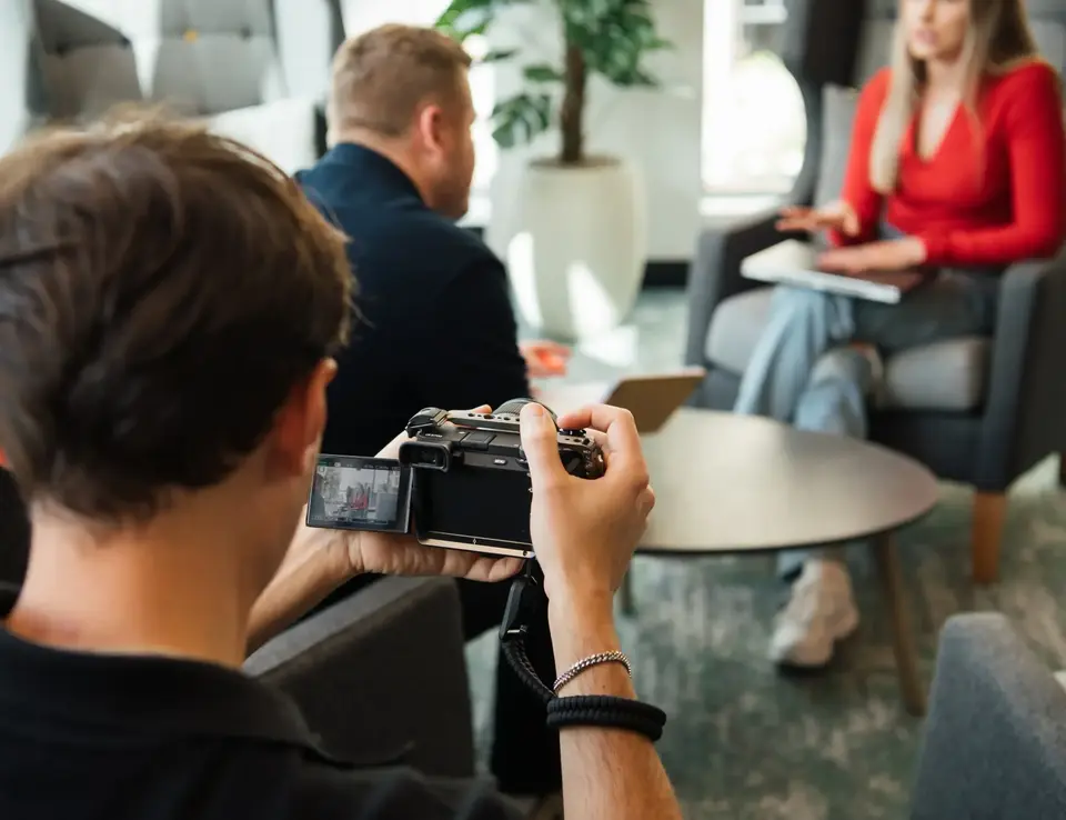 a man holding a camera