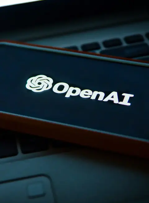 a cell phone on a keyboard