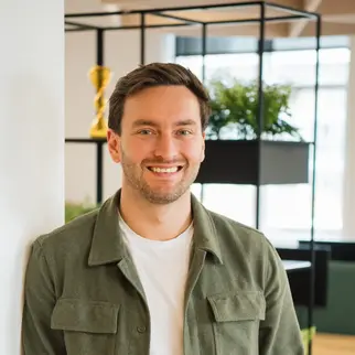 a man smiling at camera