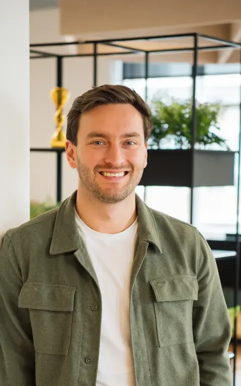 a man smiling at camera