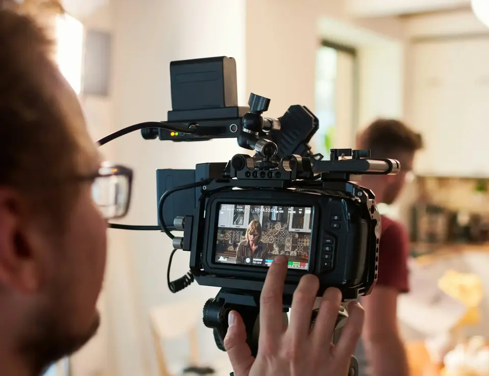 a man holding a camera