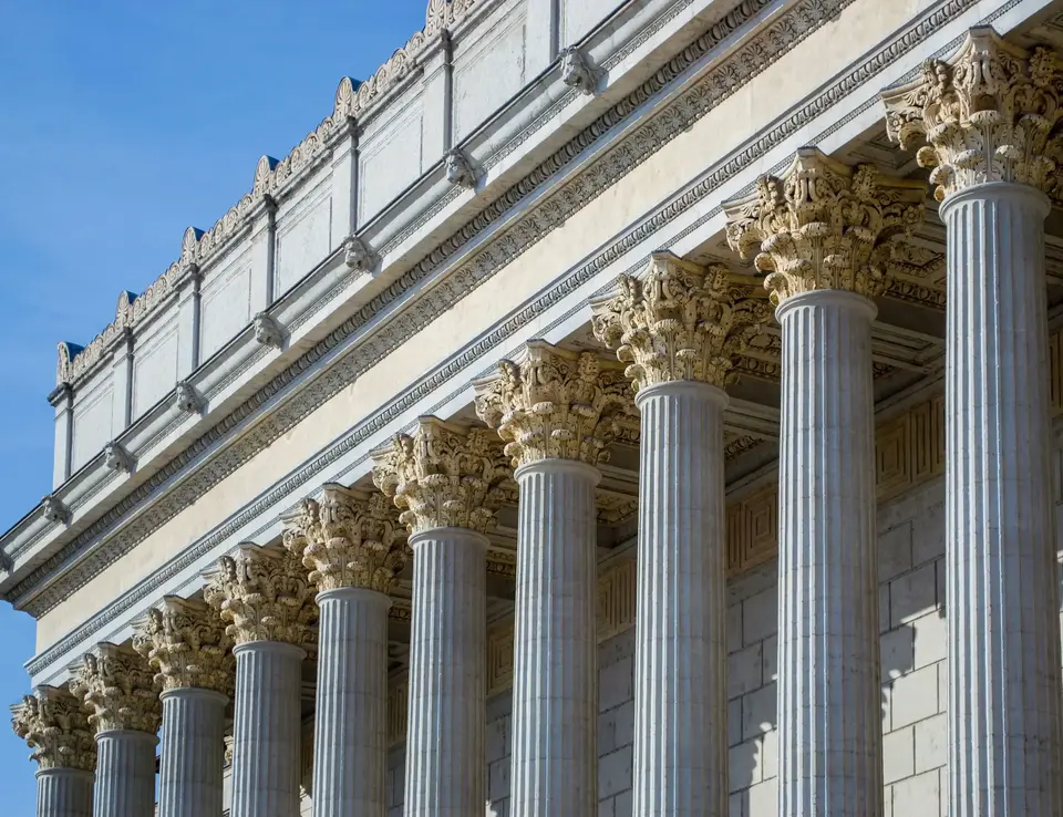 a building with columns and a roof