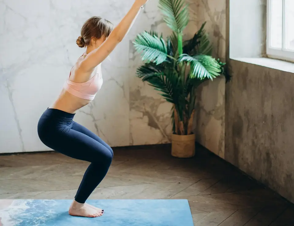 a woman in a yoga pose