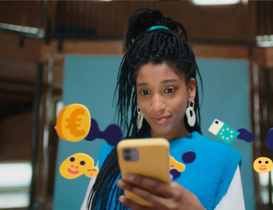 a woman holding a phone