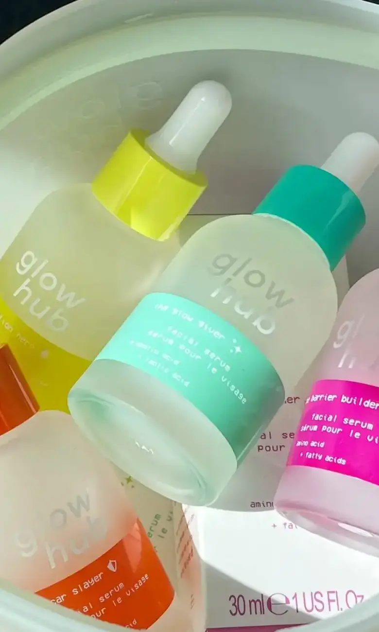 a group of bottles in a bucket