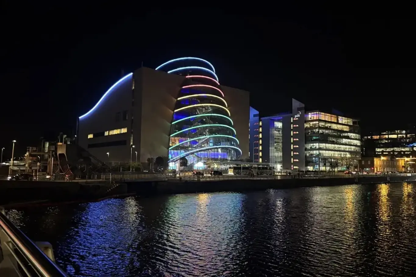 a building with lights on the side of it