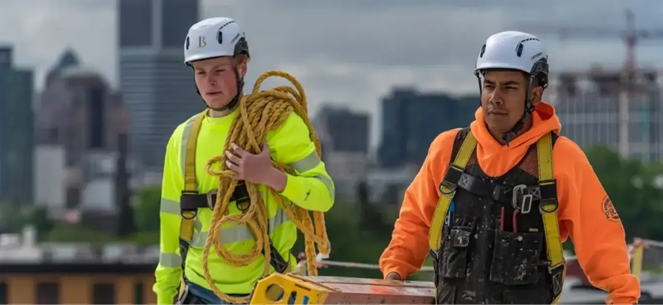 a group of men wearing safety gear