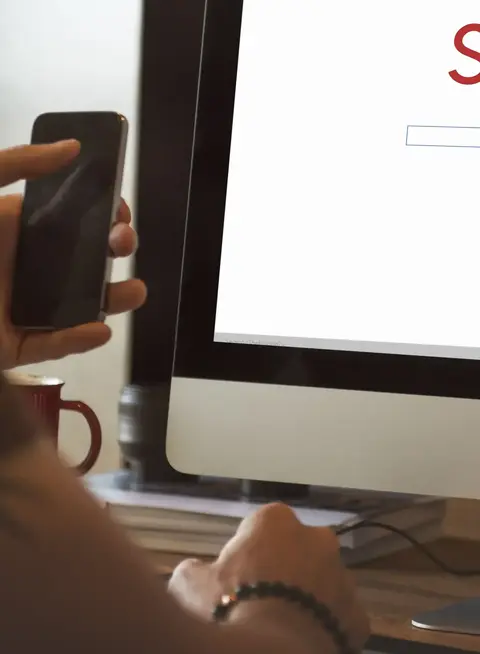 a person looking at a computer screen