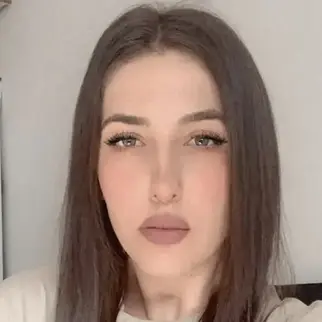 a woman taking a selfie