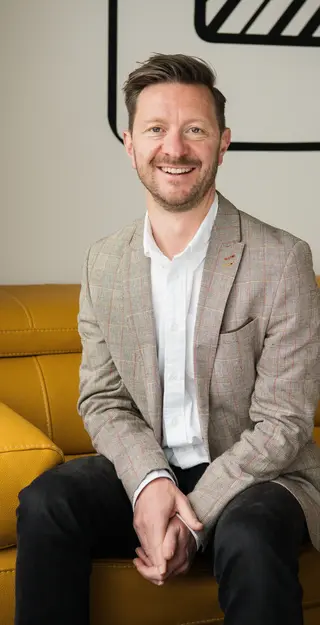 a man sitting on a couch