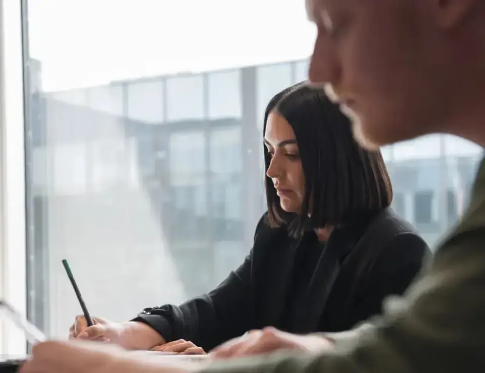 a man and woman sitting at a table