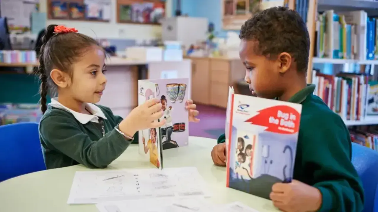 Children reading books together