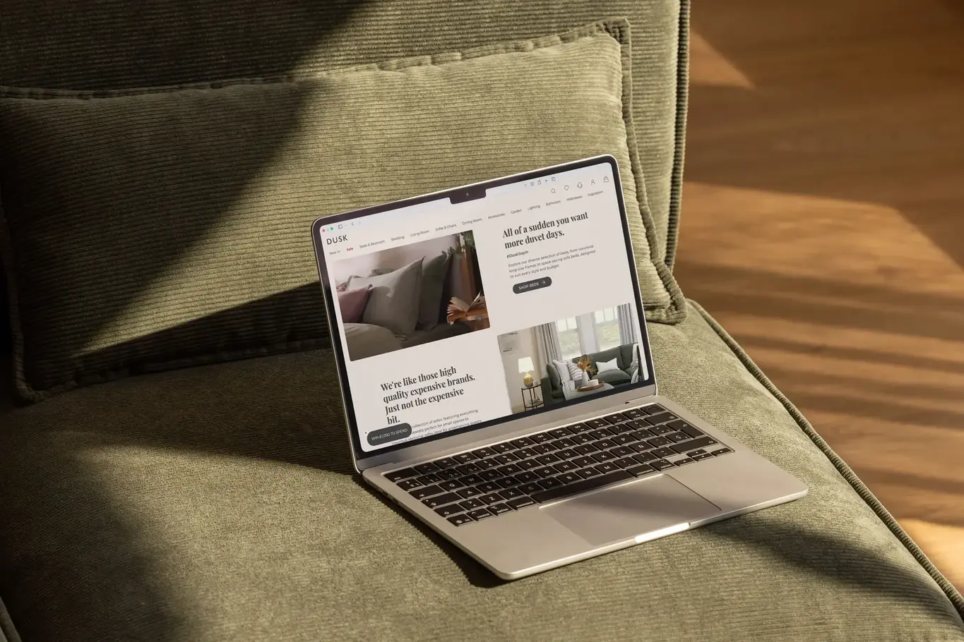 a laptop on a couch