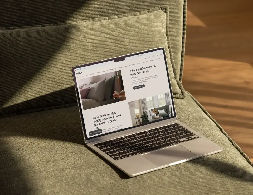 a laptop on a couch