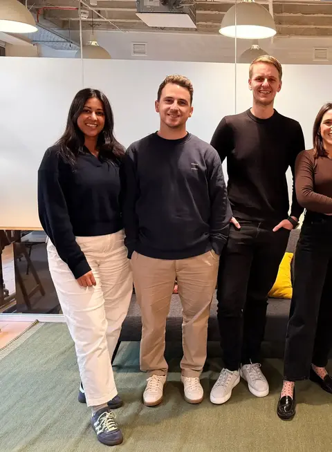 a group of people posing for a photo