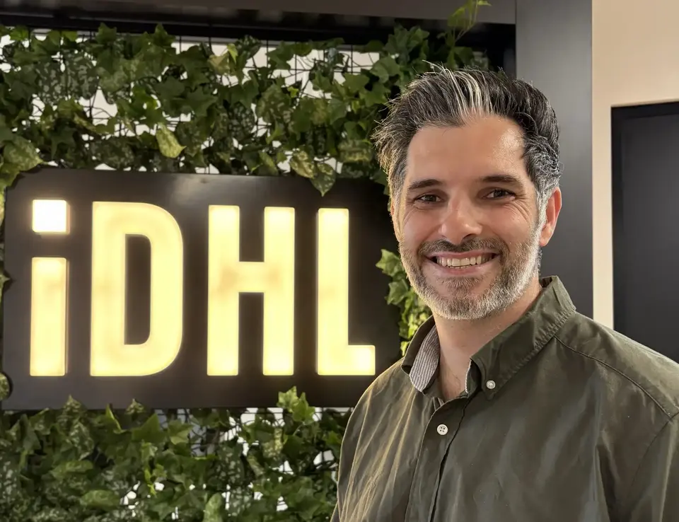 New IDHL member, Alex Wright, stood in the IDHL Leeds office