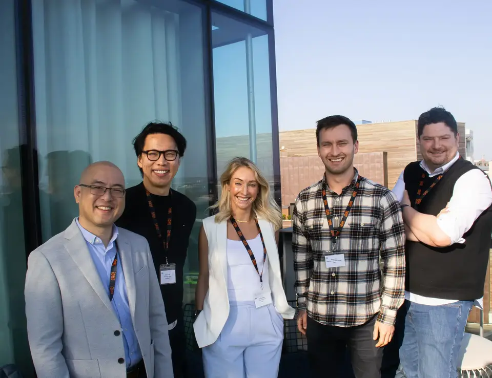 a group of people posing for a photo