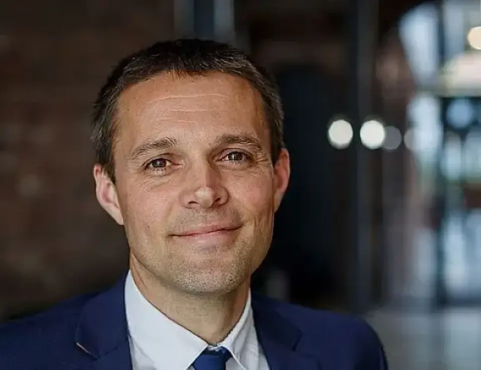 Mike Sprot in his suit and tie