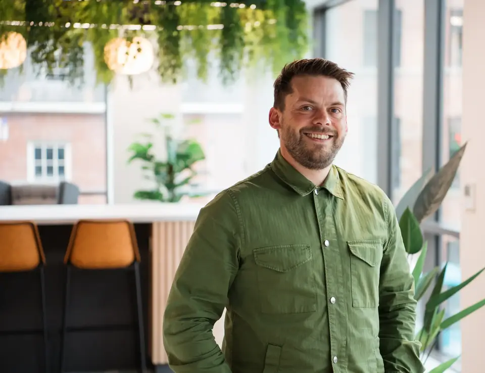 a man in green shirt