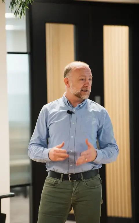 a man in a blue shirt