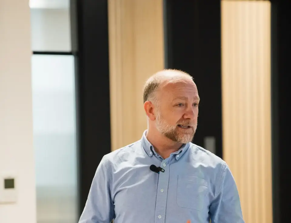 a man in a blue shirt