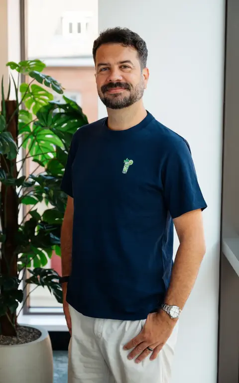 a man standing in front of a counter