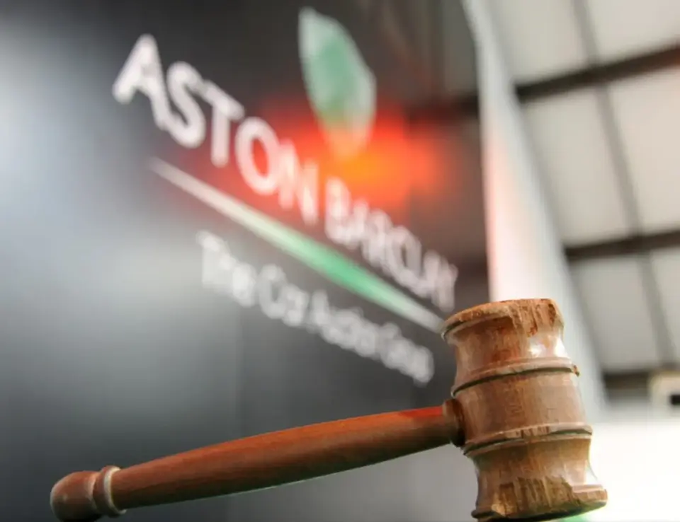 a wooden gavel on a table