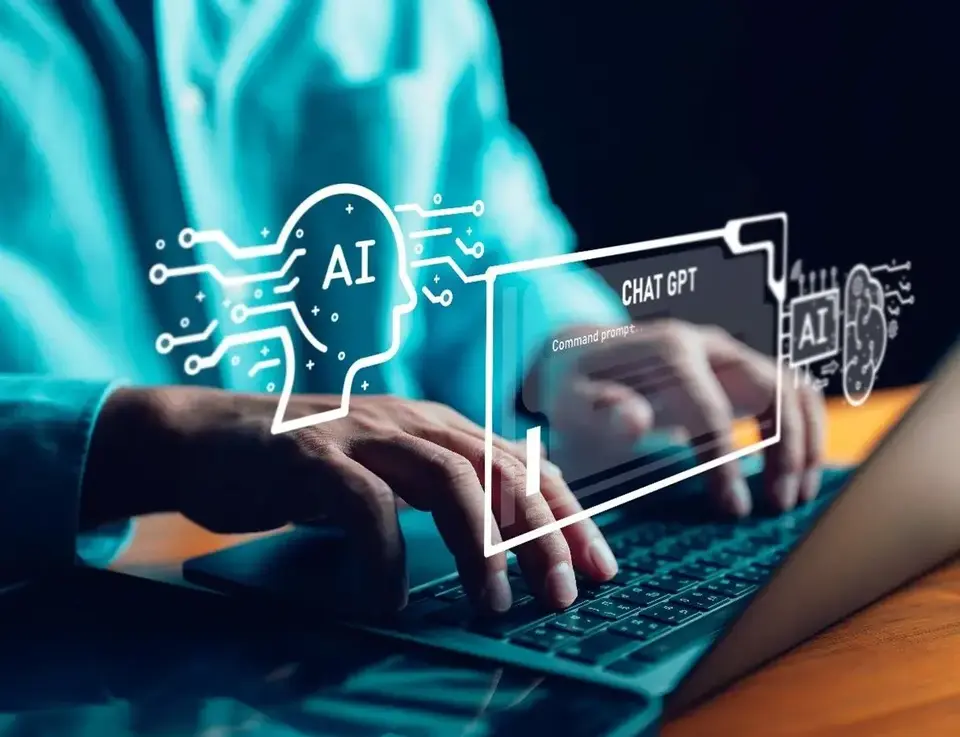 a person typing on a laptop