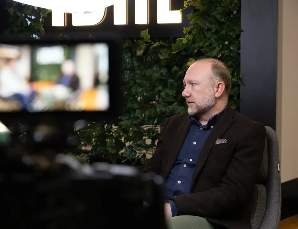 a man sitting in a chair