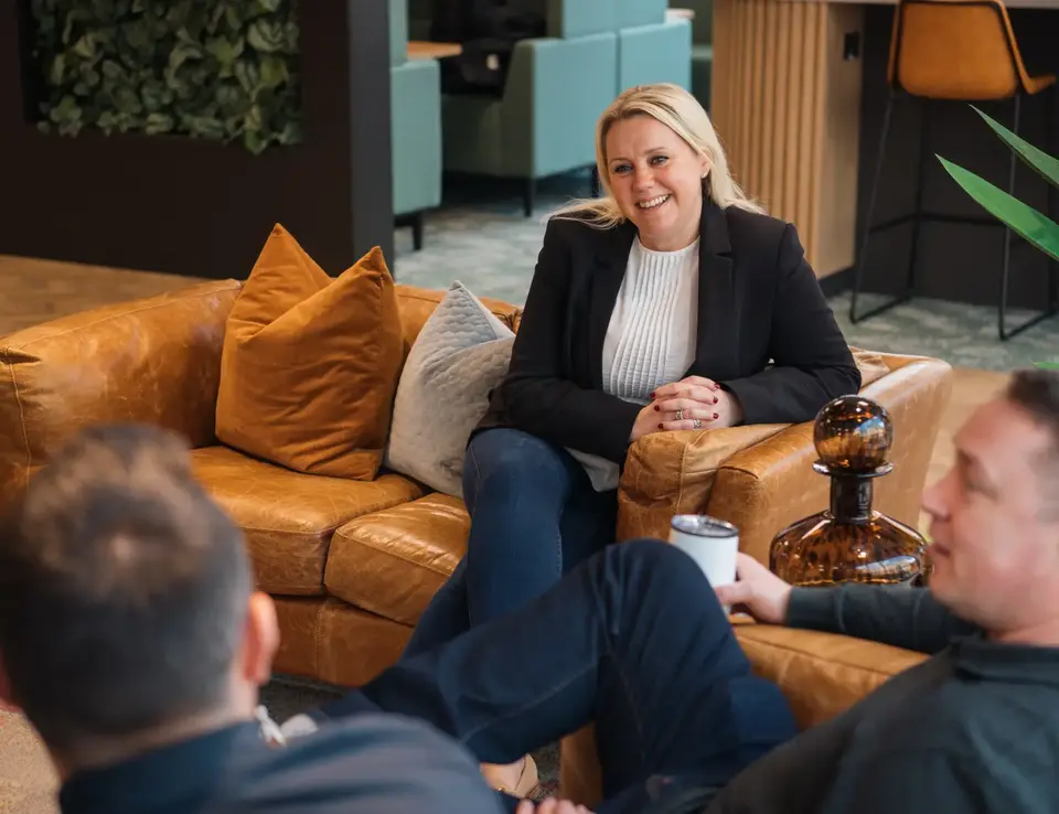 a group of people sitting on a couch