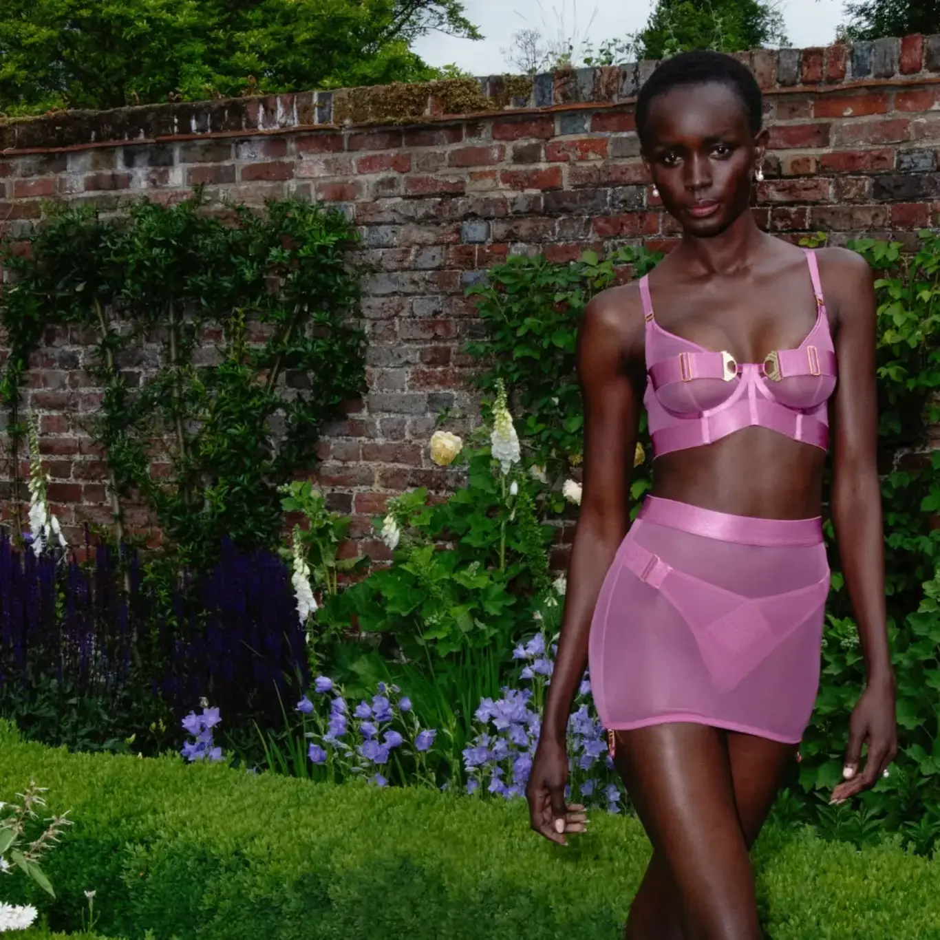 a woman in pink lingerie
