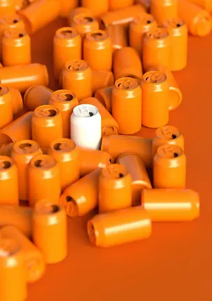 a group of orange soda cans