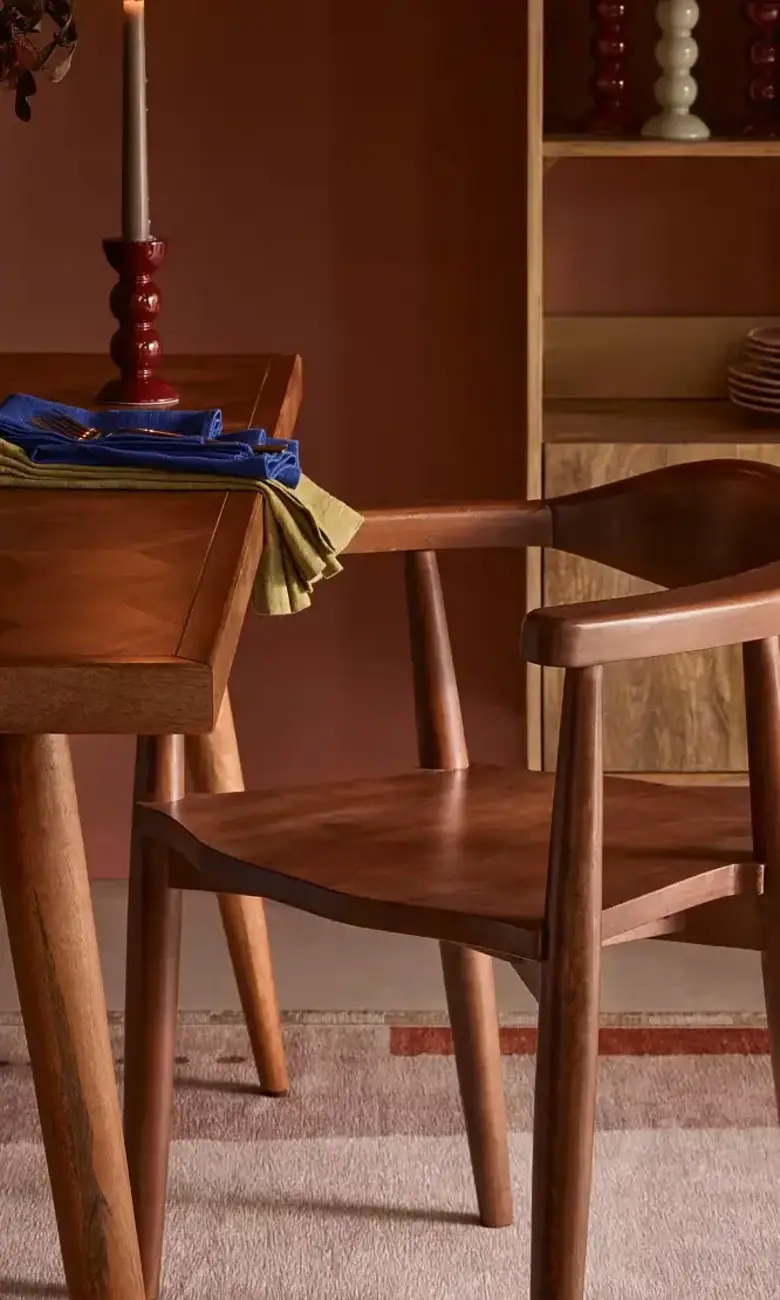 a chair next to a table