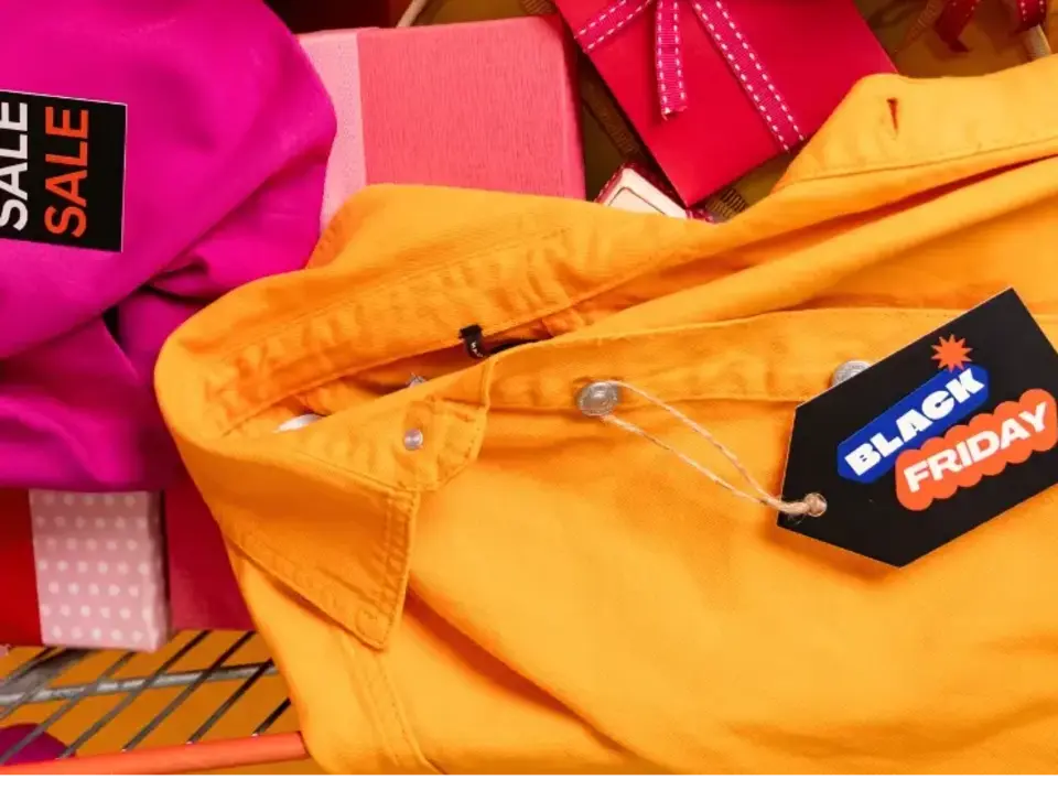 a yellow shirt with a tag on it