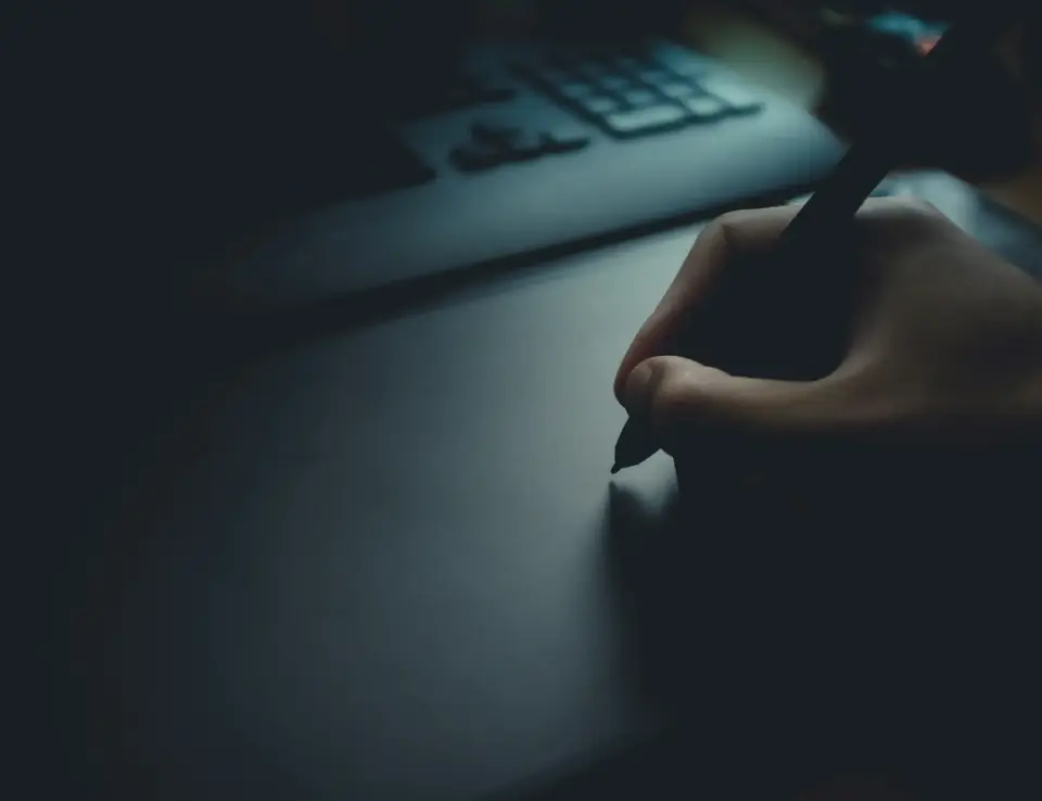 Hand on digital screen