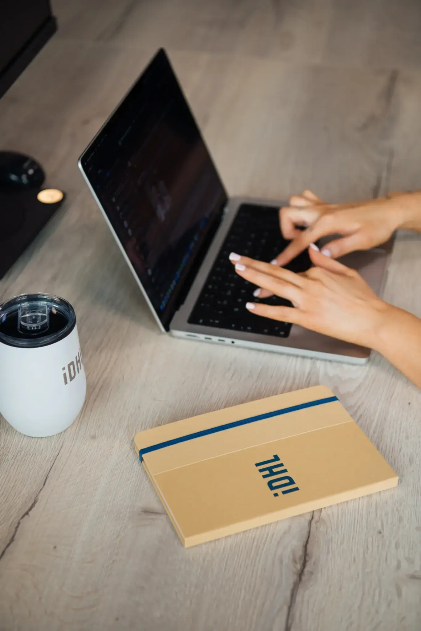 a person typing on a laptop