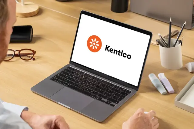 Kentico logo on laptop