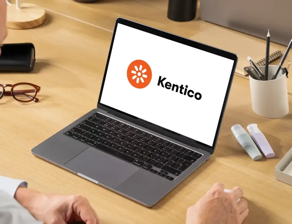 Kentico logo on laptop