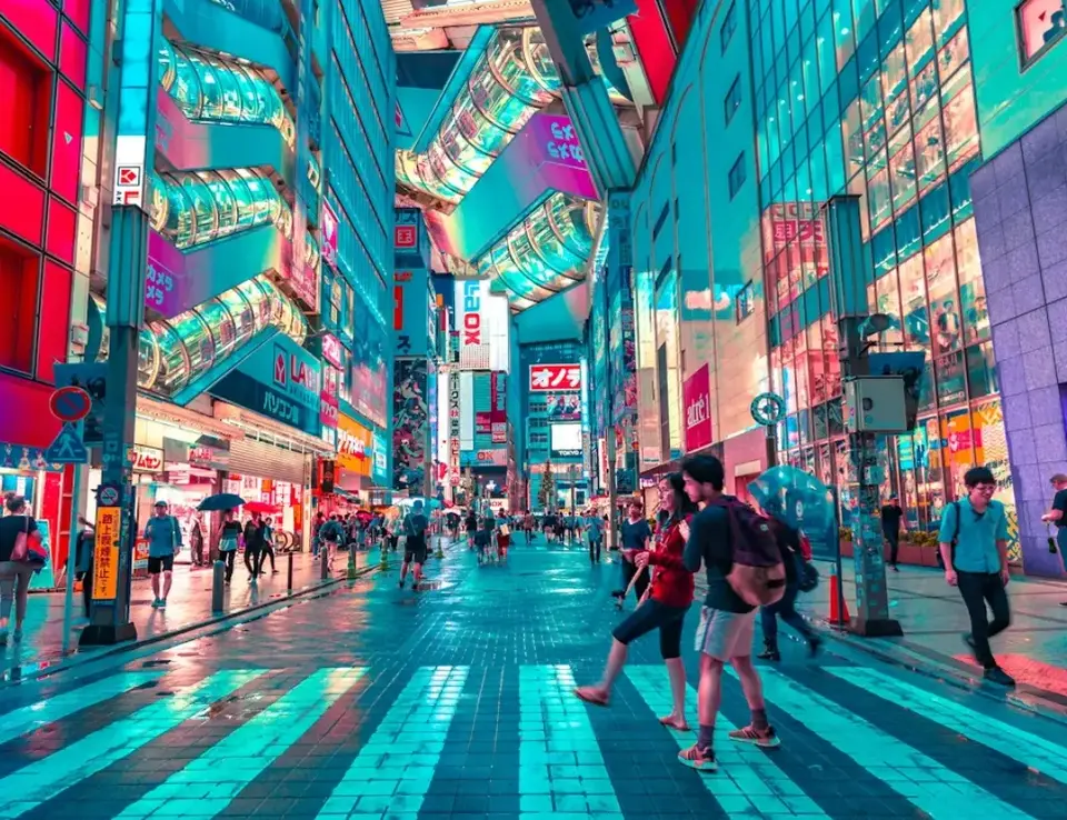 People crossing zebra crossing in a neon lit shopping mall