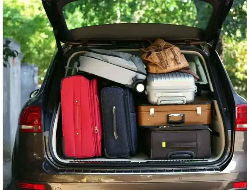 a car with luggage in the trunk
