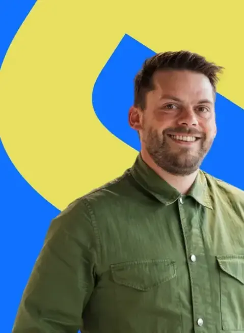 a man in a green shirt