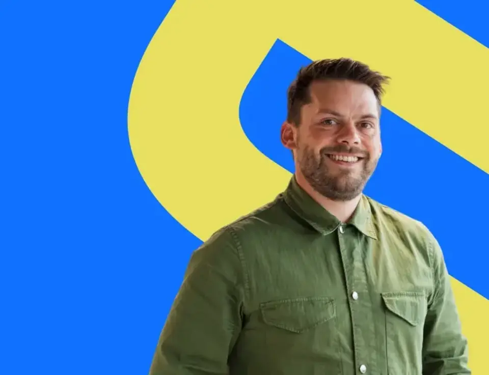 a man in a green shirt