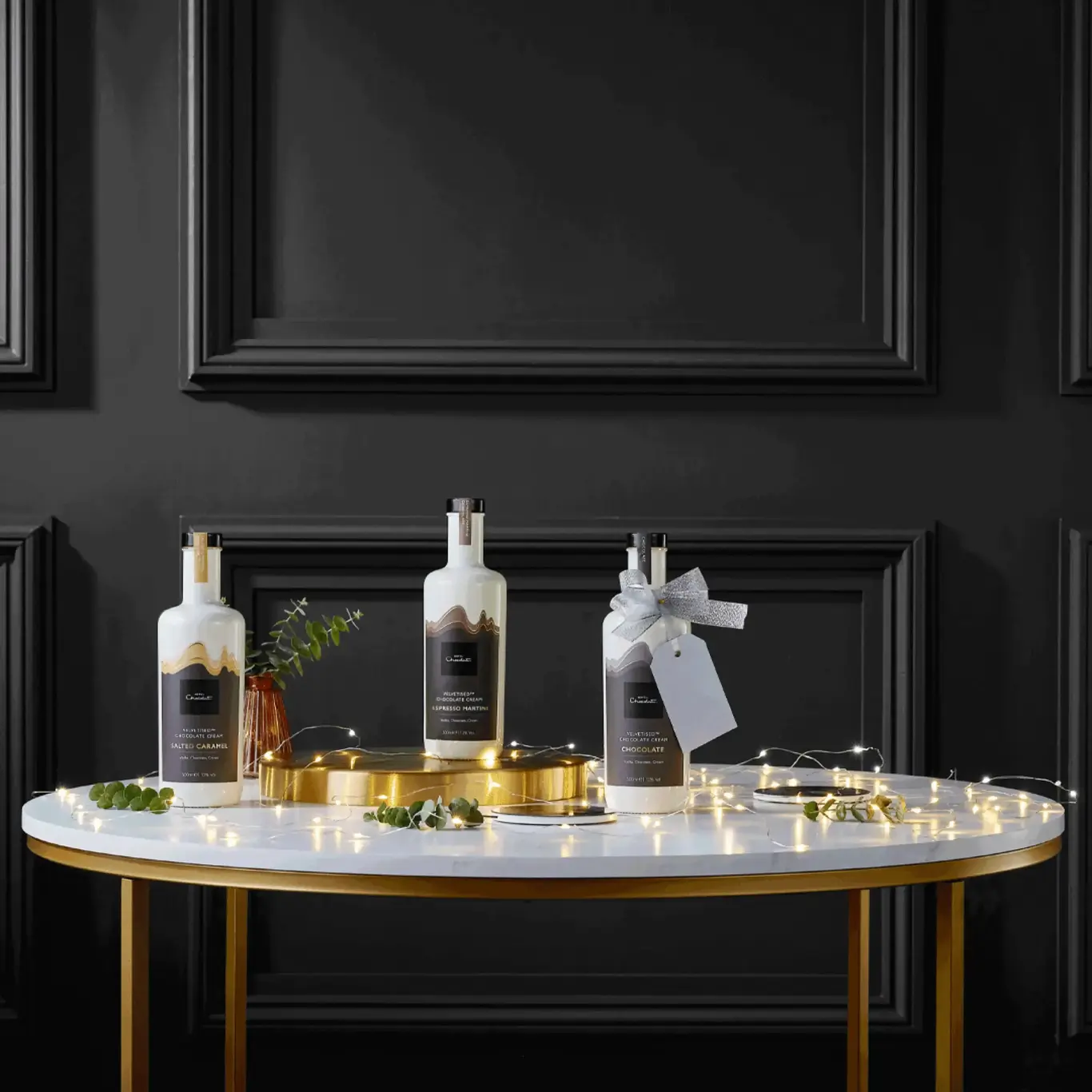 a table with white and gold objects on it