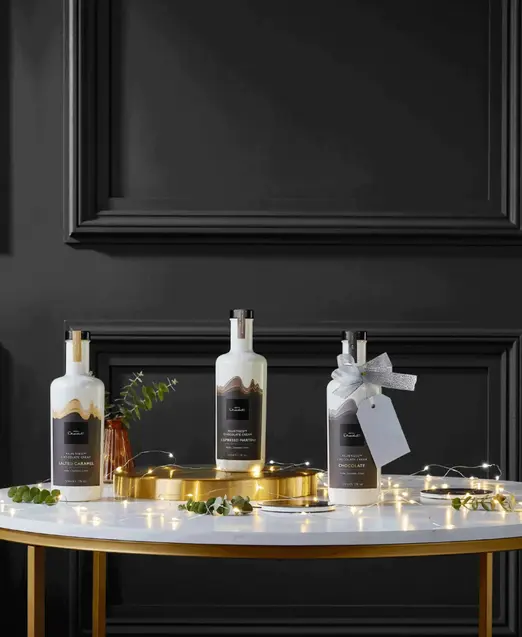 a table with white and gold objects on it